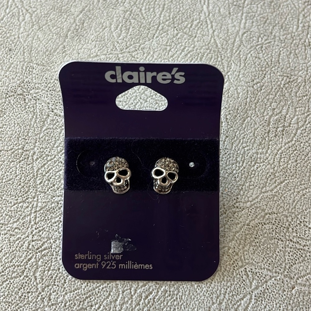 Claire’s sterling silver skull earrings brand new